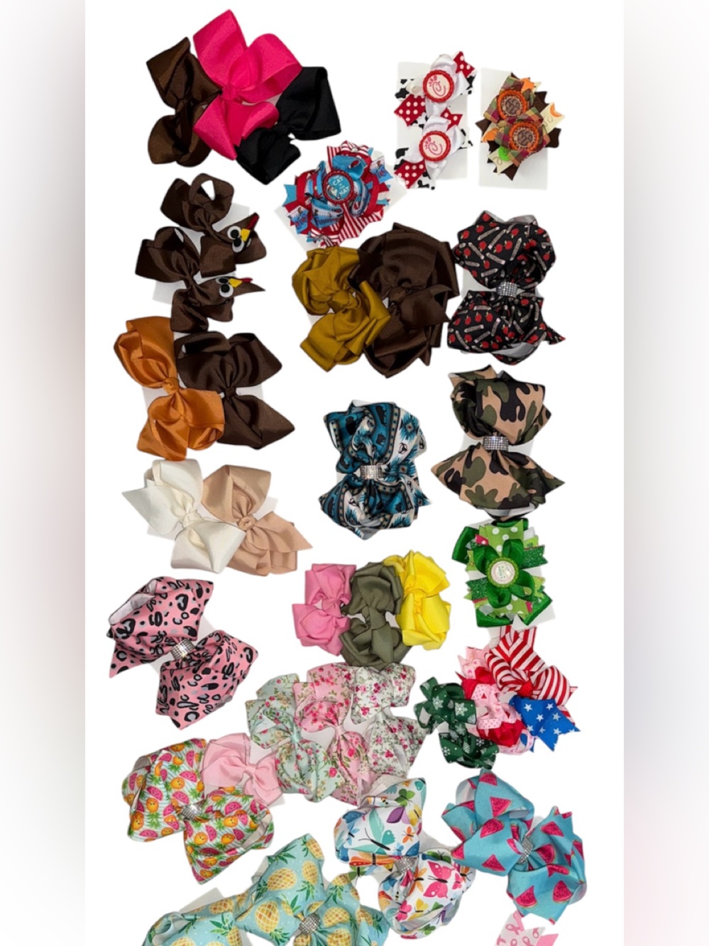 Girls array of hair bows. 
Approximately 40 hair bows and 5 headbands.